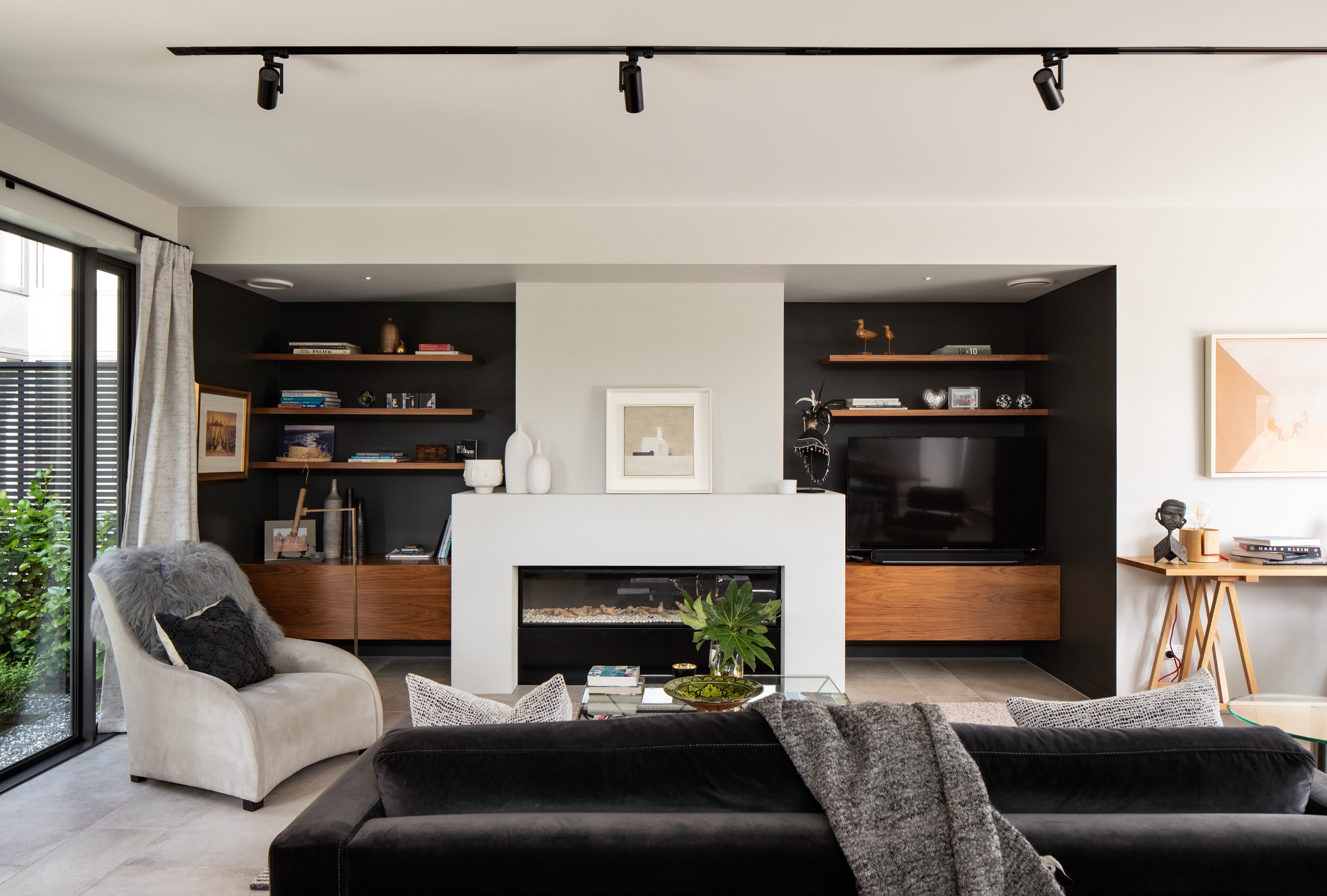 Living area with furniture and shelving